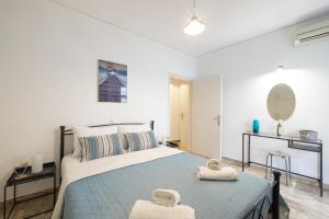 Posteľ alebo postele v izbe v ubytovaní Magdalenia's cozy apartments