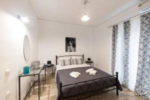 Posteľ alebo postele v izbe v ubytovaní Magdalenia's cozy apartments