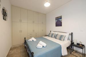 Posteľ alebo postele v izbe v ubytovaní Magdalenia's cozy apartments