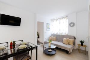 Televízia a/alebo spoločenská miestnosť v ubytovaní Magdalenia's cozy apartments