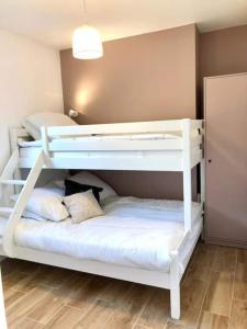 Posteľ alebo postele v izbe v ubytovaní Nouveau ! La cabine du bout du monde - Le Portzic : votre maison de vacances de haut standing - PL6