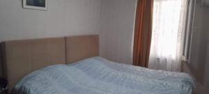 Postel nebo postele na pokoji v ubytování Tariel Guest House