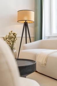 A bed or beds in a room at josef's home I Premium Suite I Quiet & Central