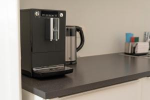 A kitchen or kitchenette at josef's home I Premium Suite I Quiet & Central