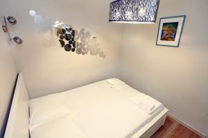 Cama o camas de una habitación en Pristine One-Bedroom Apartment in Piran IRED