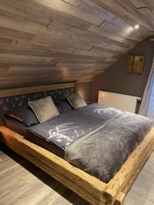 Postel nebo postele na pokoji v ubytování Chalet am Weißenbach