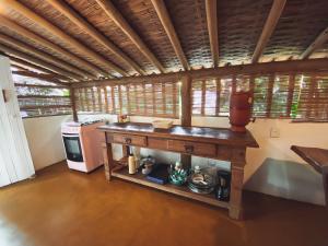 Köök või kööginurk majutusasutuses Vila Flor de Jambo