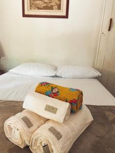 Voodi või voodid majutusasutuse Vila Flor de Jambo toas