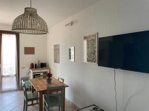 Telewizja i/lub zestaw kina domowego w obiekcie The Loft E&E Chianti Room