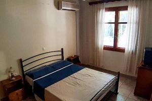 A bed or beds in a room at Sophie's traditional hospitality appartment