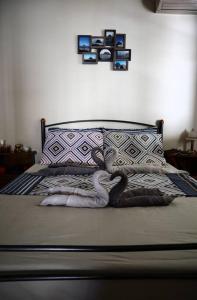 A bed or beds in a room at Sophie's traditional hospitality appartment