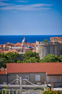 a view of a city with a castle and buildings at Newly renovated apt. near to entrance to Old Town in Dubrovnik