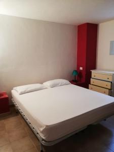 Posteľ alebo postele v izbe v ubytovaní Dammuso Campobello Mattias , via santa chiara, 7