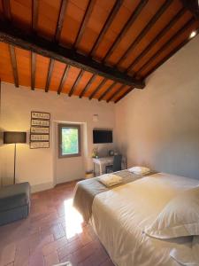 Postel nebo postele na pokoji v ubytování Casale La Gora - B&B di charme