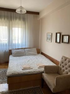 Säng eller sängar i ett rum på Family Apartment Ivanovic