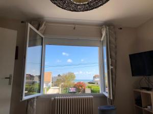 Telewizja i/lub zestaw kina domowego w obiekcie La Maison des phares