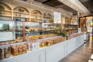 a bakery with a lot of food on display at Dosso Dossi Hotels Yenikapı in Istanbul