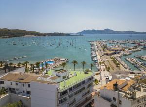 a view of a harbor with boats in the water at Apartamento Anamsa in Port de Pollensa