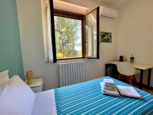 A bed or beds in a room at Agriturismo con cucina Il Favaio