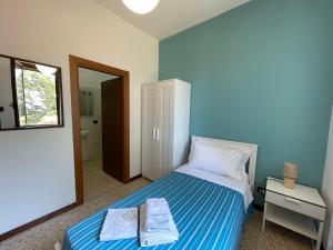 A bed or beds in a room at Agriturismo con cucina Il Favaio