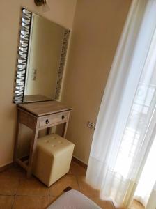 Postel nebo postele na pokoji v ubytování Oikia Dinachris