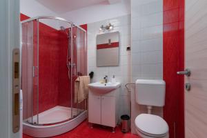 Koupelna v ubytování Blue Apartment G&G + 21 fotografií