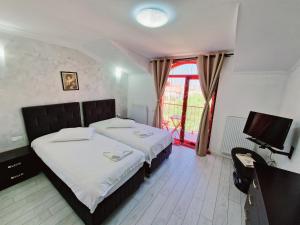 Postel nebo postele na pokoji v ubytování Pension Terra