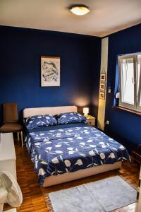 Posteľ alebo postele v izbe v ubytovaní apartman Iva