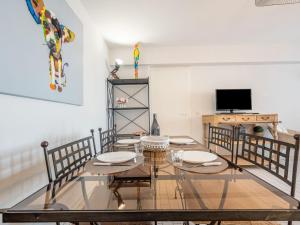 Televízia a/alebo spoločenská miestnosť v ubytovaní Apartment Hacienda 3 by Interhome