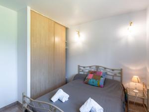 Posteľ alebo postele v izbe v ubytovaní Villa Les Rosiers by Interhome