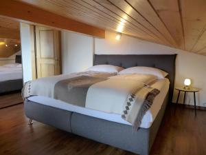 Postel nebo postele na pokoji v ubytování Apartment Brienz Sunset by Interhome