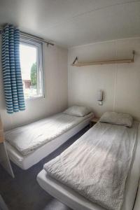 Posteľ alebo postele v izbe v ubytovaní Holiday Home Florida by Interhome