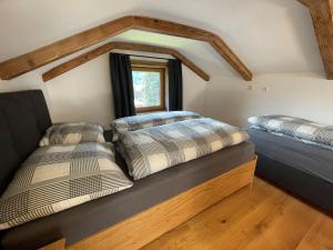 Posteľ alebo postele v izbe v ubytovaní Holiday Home Haus Nussbaum by Interhome