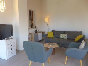 TV a/nebo společenská místnost v ubytování Apartment Tilleul by Interhome