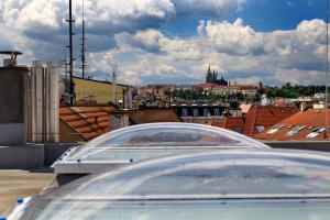 Nespecifikovaný výhled na destinaci Praha nebo výhled na město při pohledu z hotelu