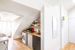 Kuchyňa alebo kuchynka v ubytovaní St André 5D - SAINT GERMAIN DES PRES - STUDIO PERFECT PLACE