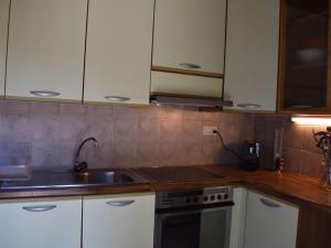 Kuchyň nebo kuchyňský kout v ubytování Apartment App- Bosco-Ticino Ticket Inklusive! by Interhome