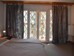 Postel nebo postele na pokoji v ubytování Apartment App- Bosco-Ticino Ticket Inklusive! by Interhome