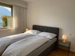 Postel nebo postele na pokoji v ubytování Apartment Lakeview by Interhome