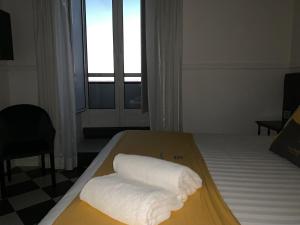 Posteľ alebo postele v izbe v ubytovaní Hotel Stabia