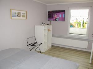 Μια τηλεόραση ή/και κέντρο ψυχαγωγίας στο Holiday Home Philipp by Interhome