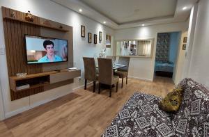 TV a/nebo společenská místnost v ubytování Apartamento Top, 3 quartos, Wi-Fi 300 Mbps