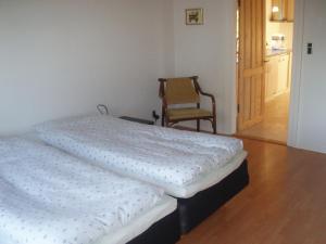 En eller flere senge i et værelse på Tødsø Bed & Bath Holiday Home