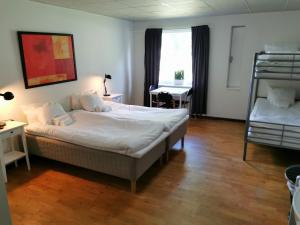 Postel nebo postele na pokoji v ubytování Möre Hotell & Konferens