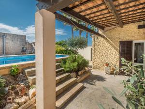 The swimming pool at or close to Holiday Home Mare by Interhome