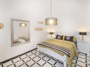 A bed or beds in a room at Holiday Home Mare by Interhome