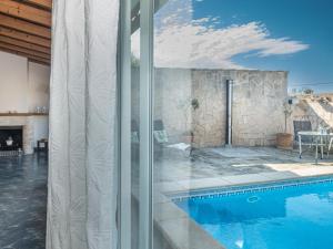 The swimming pool at or close to Holiday Home Mare by Interhome