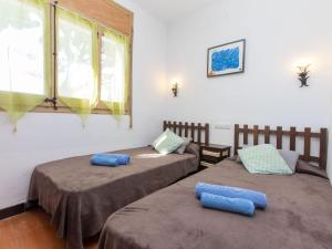 Posteľ alebo postele v izbe v ubytovaní Apartment Les Cigales by Interhome