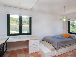 Posteľ alebo postele v izbe v ubytovaní Holiday Home Ullastreta by Interhome