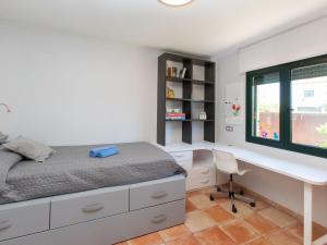 Posteľ alebo postele v izbe v ubytovaní Holiday Home Ullastreta by Interhome